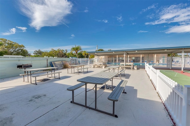 view of home's community with a patio area