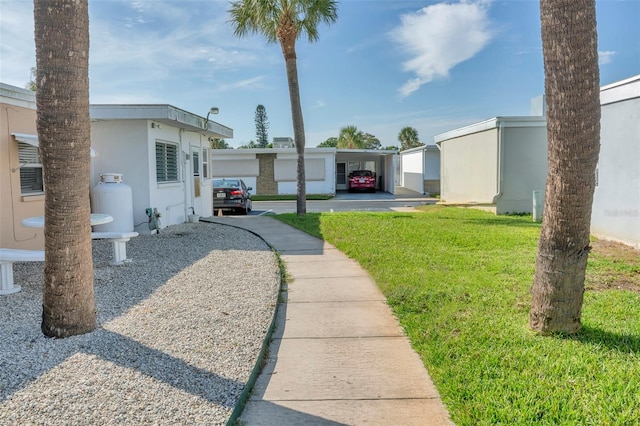 view of yard featuring a carport