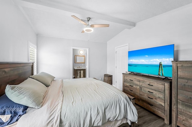 bedroom with a textured ceiling, connected bathroom, dark hardwood / wood-style flooring, ceiling fan, and vaulted ceiling with beams