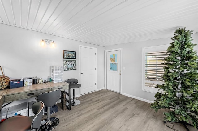 office space featuring wood finished floors and baseboards