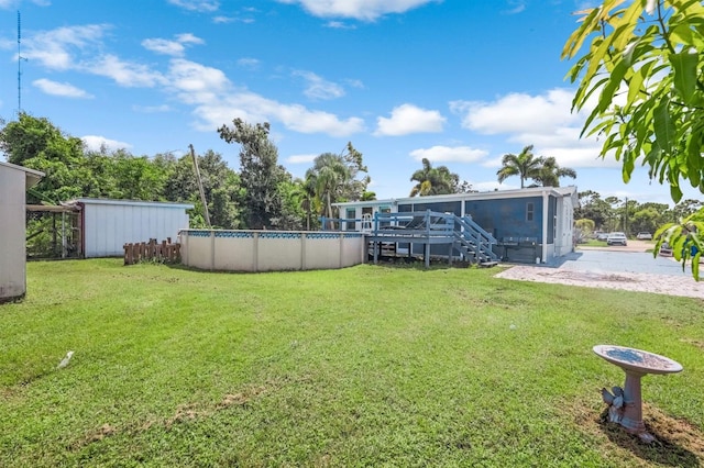 view of yard featuring a storage unit