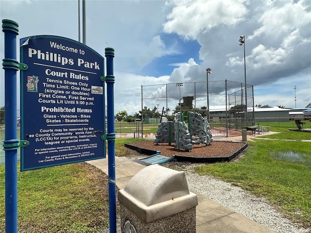 view of playground with a yard