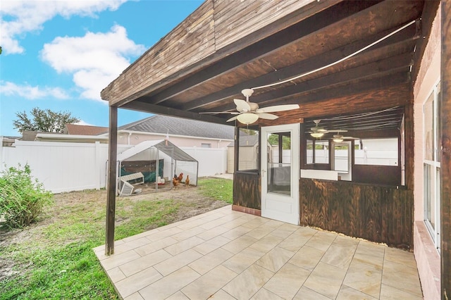 view of patio / terrace featuring ceiling fan