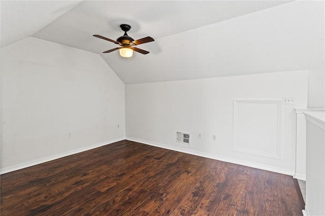 bonus room with ceiling fan, lofted ceiling, and dark hardwood / wood-style flooring