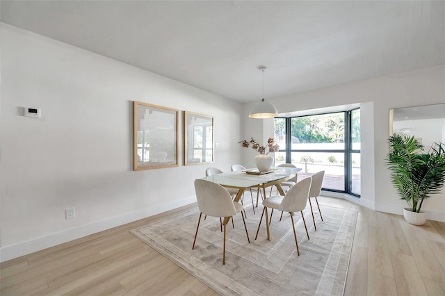 dining area featuring light hardwood / wood-style flooring