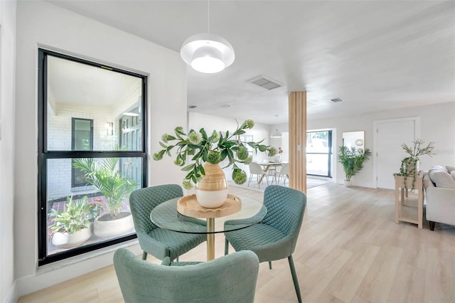 dining room featuring light hardwood / wood-style flooring