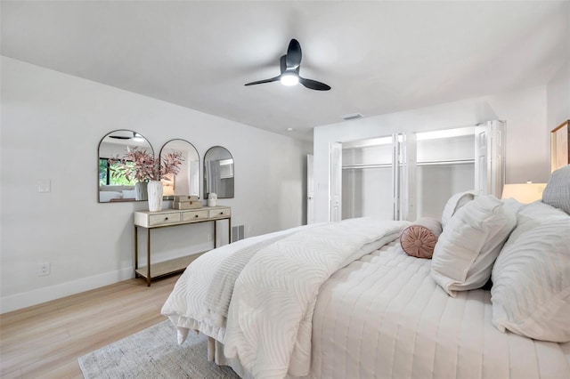 bedroom featuring ceiling fan and light hardwood / wood-style floors