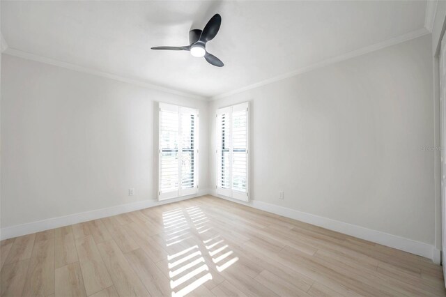 spare room featuring ceiling fan, ornamental molding, and light hardwood / wood-style floors