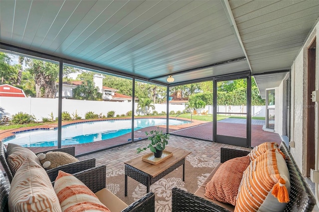 sunroom / solarium featuring a wealth of natural light