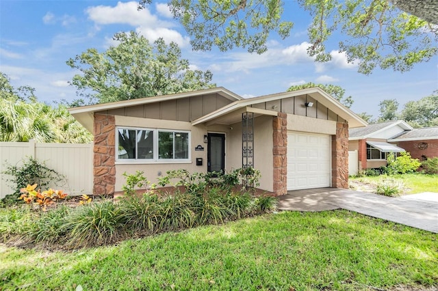 ranch-style house featuring a garage