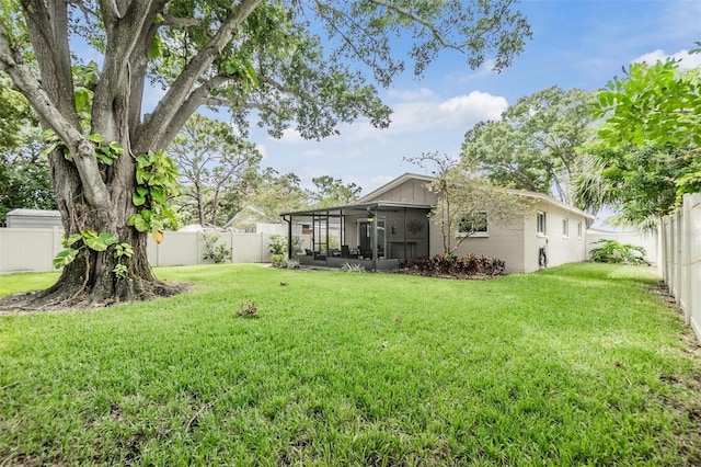 view of yard featuring a sunroom