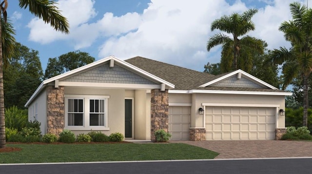 view of front facade with a front yard, an attached garage, stucco siding, stone siding, and decorative driveway