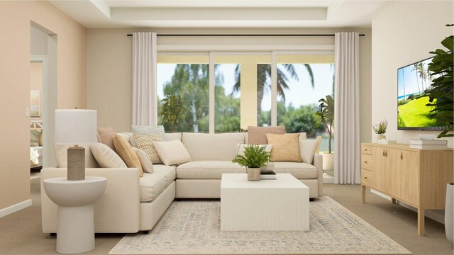 carpeted living room featuring a raised ceiling