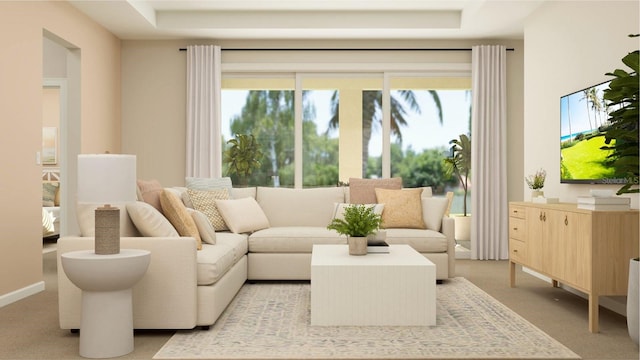 sitting room featuring light colored carpet and baseboards