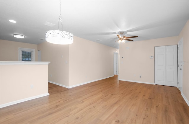 interior space featuring ceiling fan and light hardwood / wood-style floors