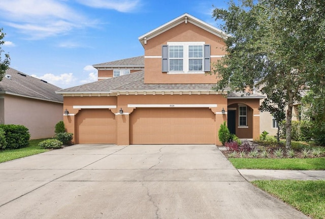 view of property featuring a garage