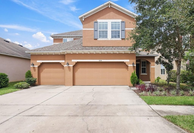 view of front of property featuring a garage