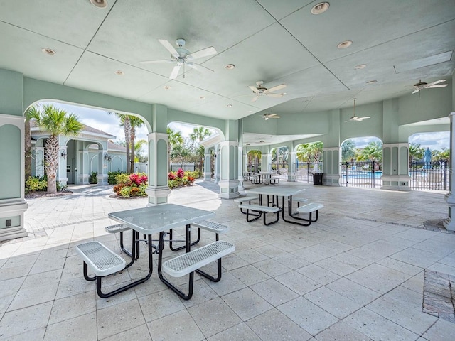 view of patio featuring ceiling fan