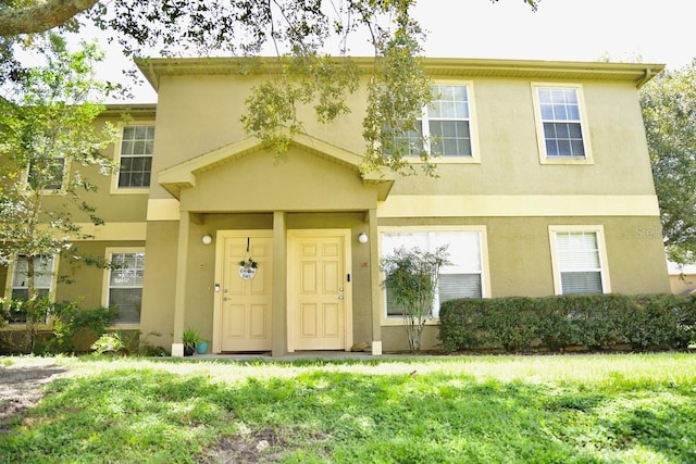 view of front of home with a front yard