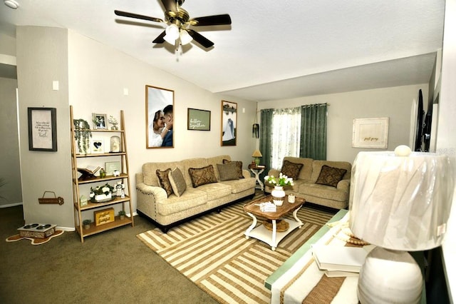 living room featuring ceiling fan and dark colored carpet