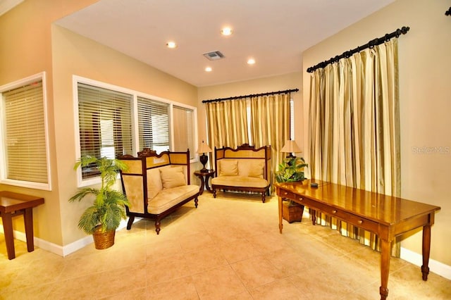 sitting room with light tile patterned flooring