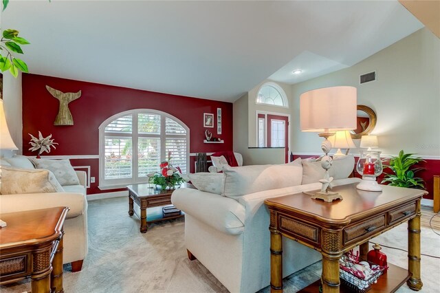 living room featuring light colored carpet