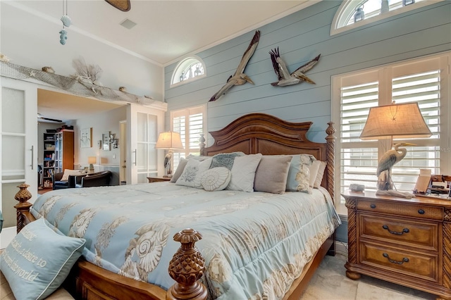 bedroom with wooden walls