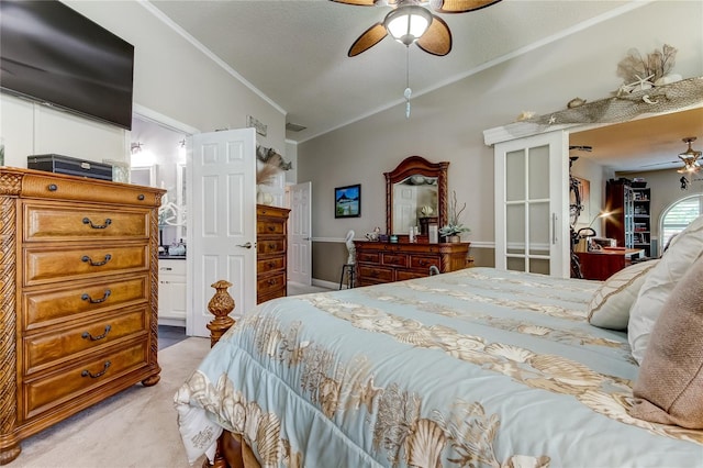 carpeted bedroom featuring ceiling fan and ornamental molding