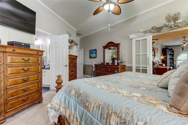bedroom featuring light carpet, crown molding, a ceiling fan, and vaulted ceiling