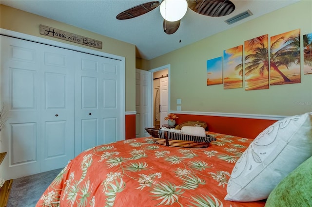 bedroom featuring ceiling fan and carpet floors