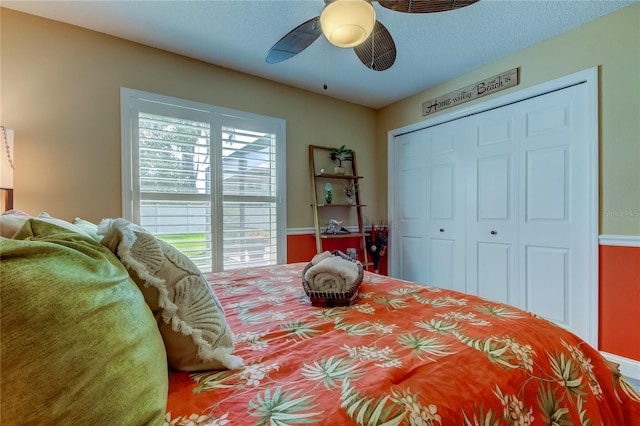 bedroom featuring a closet and ceiling fan