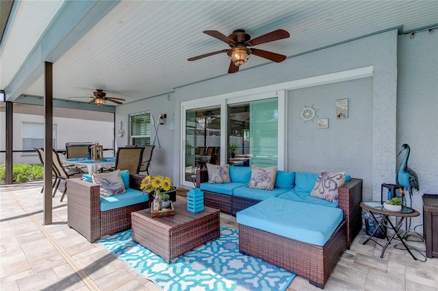view of patio with outdoor lounge area, outdoor dining space, and a ceiling fan