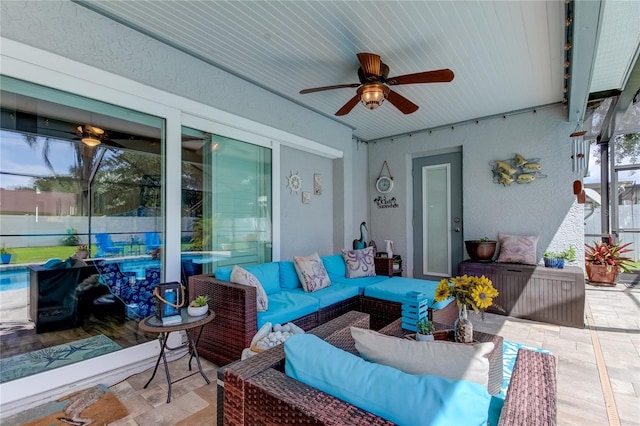 view of patio / terrace featuring an outdoor hangout area, ceiling fan, and fence