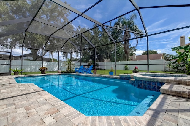 view of pool with glass enclosure, an in ground hot tub, and a patio area