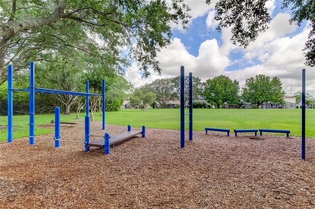 surrounding community with a playground and a yard