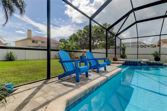 view of swimming pool featuring a lawn, a fenced backyard, a fenced in pool, an in ground hot tub, and a patio area