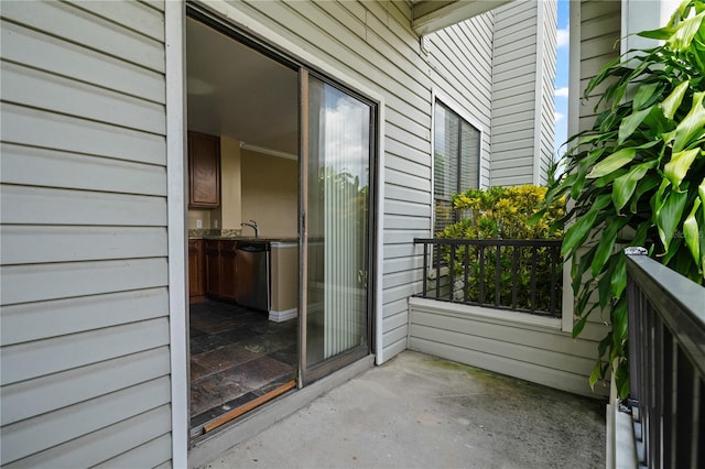 balcony featuring sink and a patio area