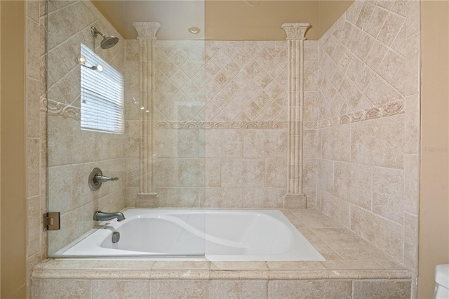 bathroom featuring shower with separate bathtub