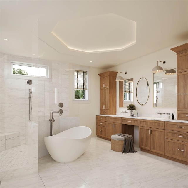 bathroom with vanity, separate shower and tub, and a raised ceiling