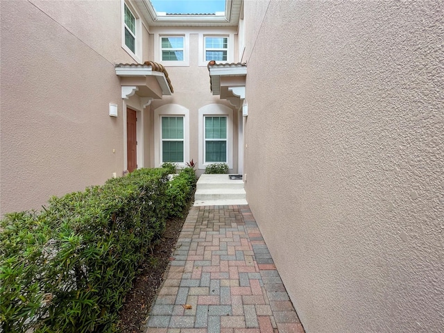 exterior space featuring stucco siding