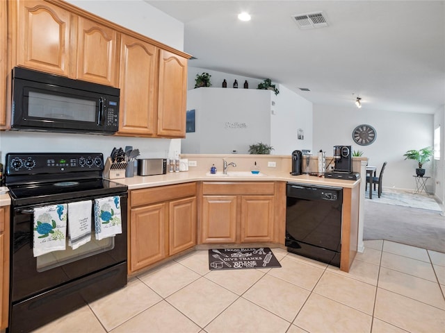 kitchen with black appliances, kitchen peninsula, sink, lofted ceiling, and light colored carpet