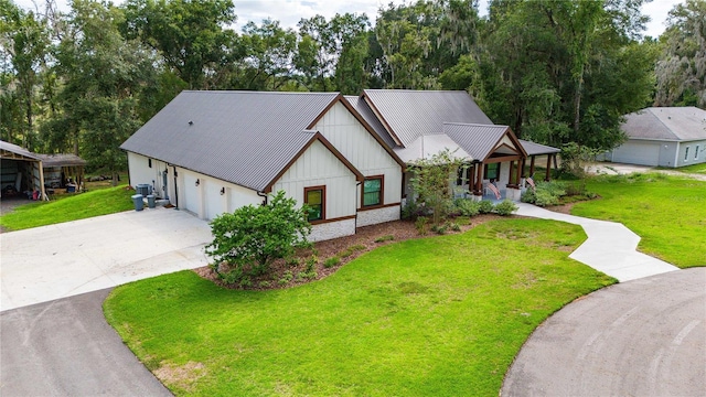 modern farmhouse style home featuring a garage, covered porch, and a front lawn