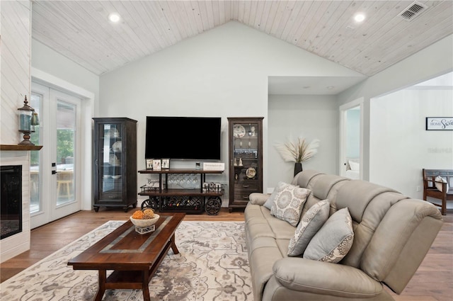 living room featuring french doors, high vaulted ceiling, wooden ceiling, and hardwood / wood-style flooring