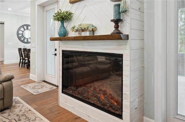 room details featuring hardwood / wood-style flooring and ornamental molding