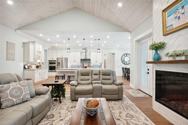 living room featuring high vaulted ceiling, wood ceiling, and light hardwood / wood-style floors