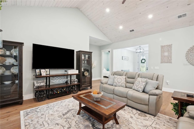 living room with light hardwood / wood-style flooring, high vaulted ceiling, wood ceiling, and ceiling fan with notable chandelier