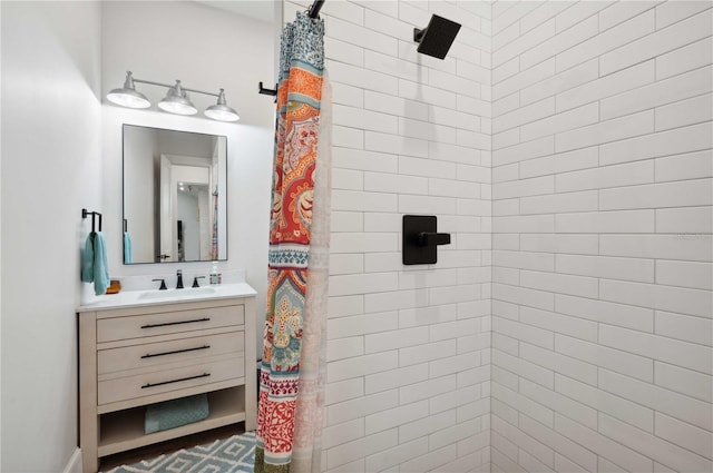 bathroom with a shower with curtain and vanity