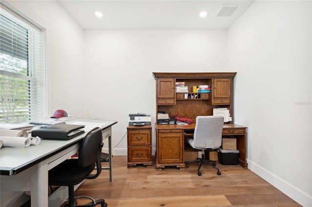 office area with light wood-type flooring