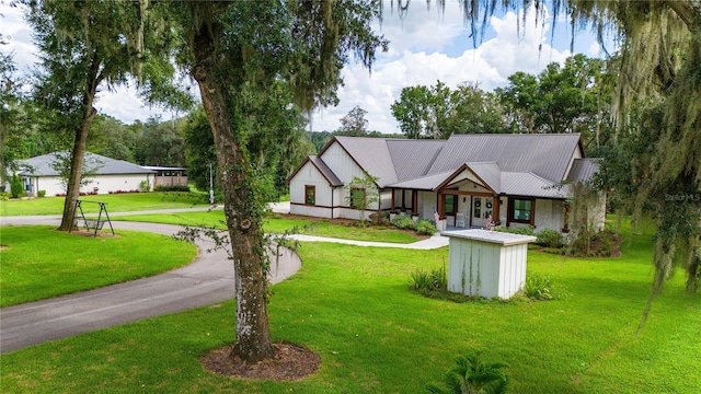 view of front of home with a front yard