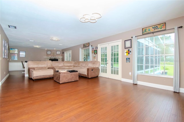 unfurnished living room with hardwood / wood-style floors